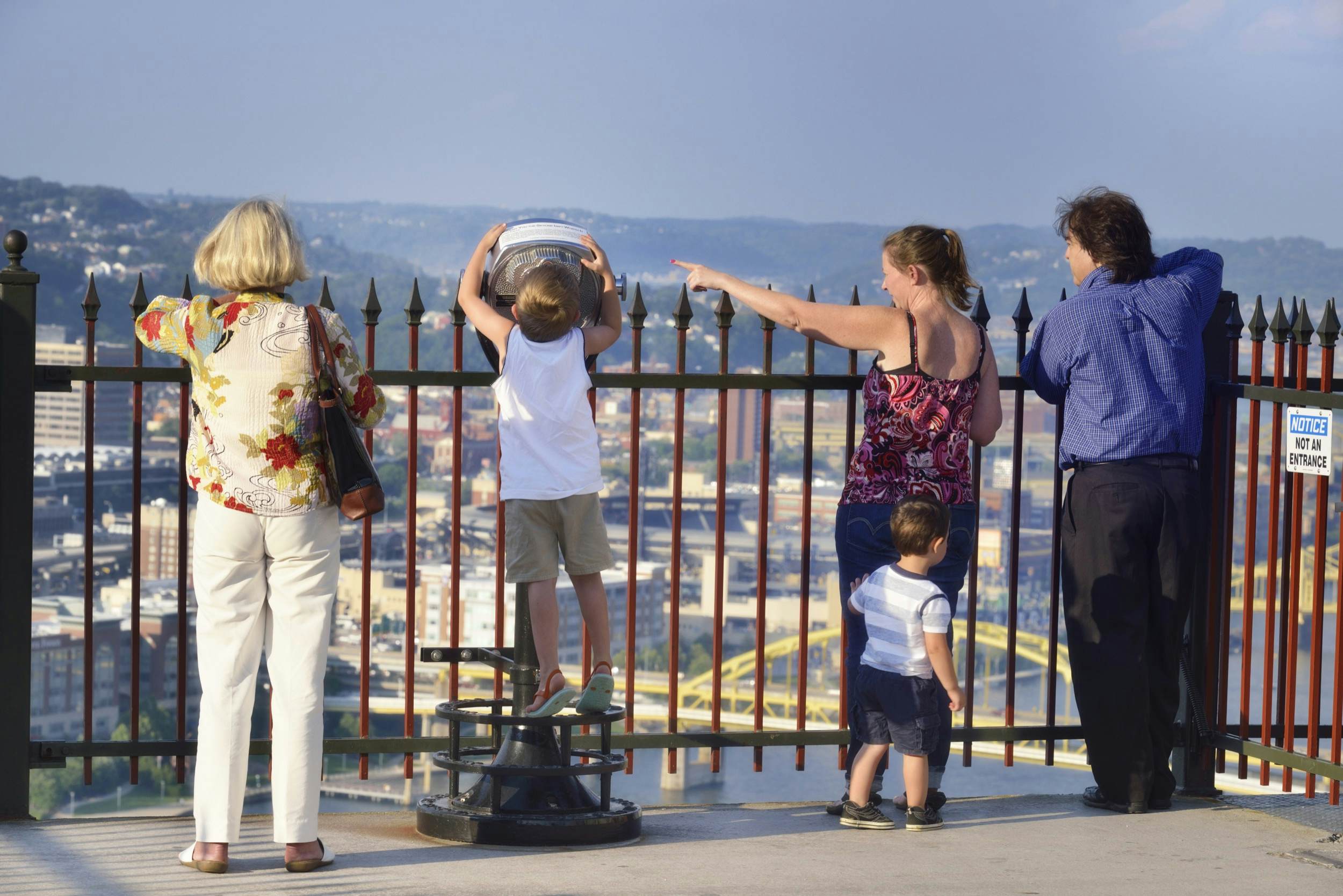 "Pittsburg, USA - July 24, 2012: Family enjoying panoramic view of Downtown Pittsburgh , PA"